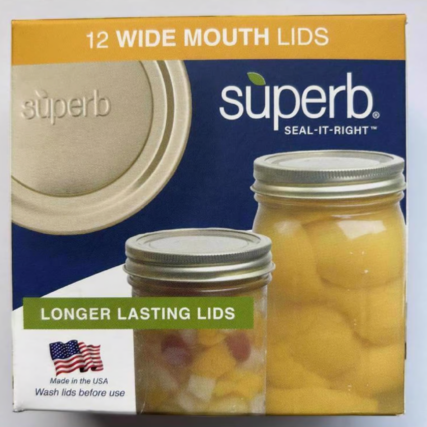 Box of superb wide mouth lids with a jar of pickles on a white background