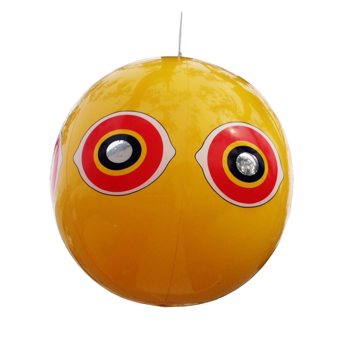Yellow spherical object with large red eyes on a white background