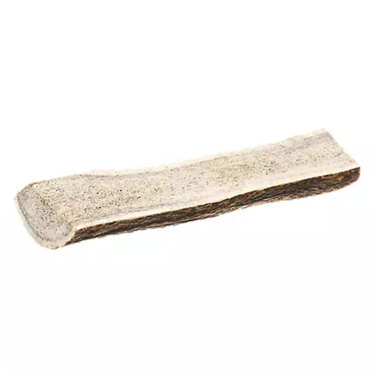 Wooden chew toy for pets on a white background