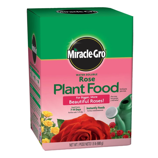 Box of Miracle-Gro Rose Plant Food with a red rose and green watering can on a white background