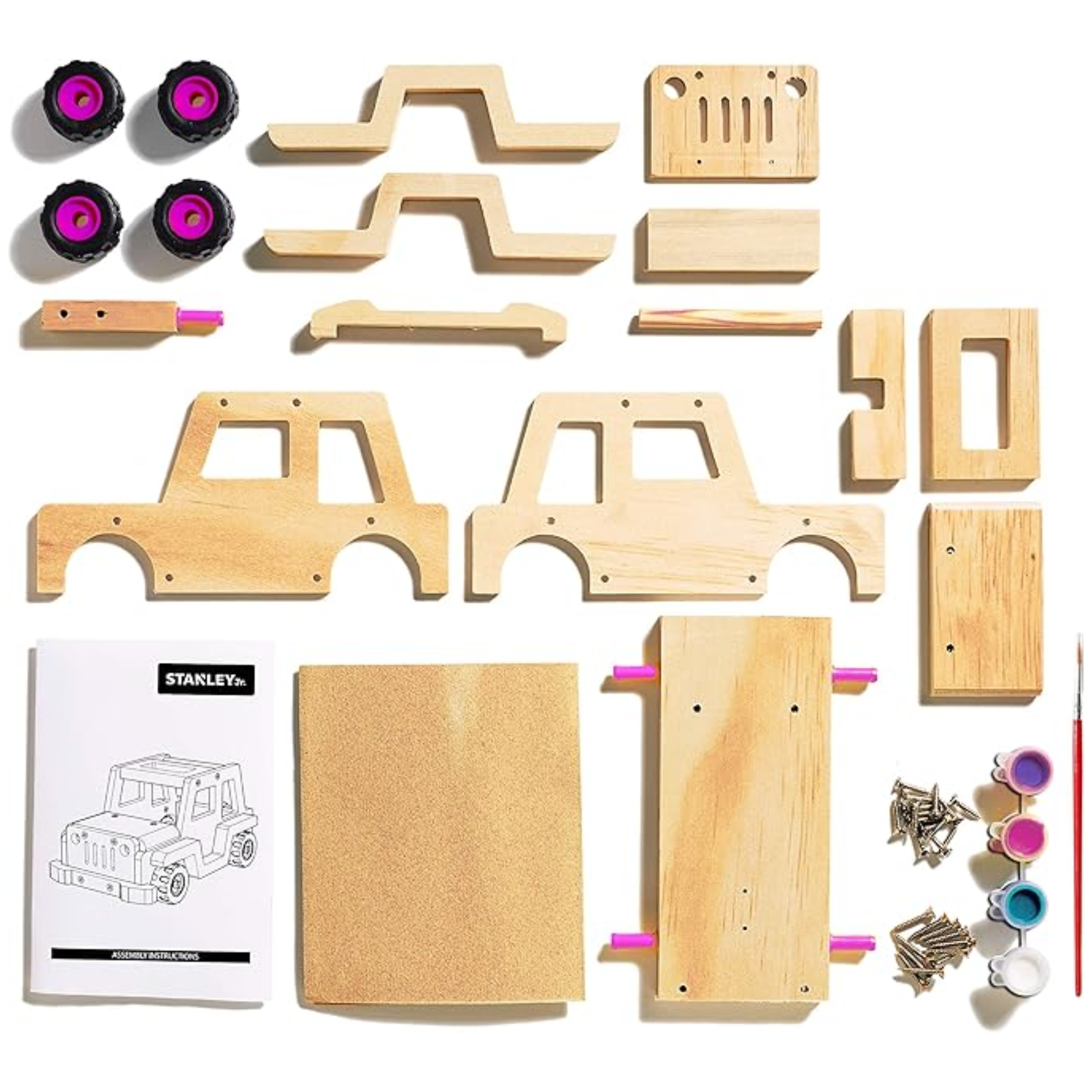 pieces of a stanley jr. diy off road vehicle kit on a white background